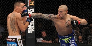 LAS VEGAS, NV - FEBRUARY 04: Dustin Poirier (right) punches Max Holloway during the UFC 143 event at Mandalay Bay Events Center on February 4, 2012 in Las Vegas, Nevada. (Photo by Nick Laham/Zuffa LLC/Zuffa LLC via Getty Images) *** Local Caption *** Dustin Poirier; Max Holloway